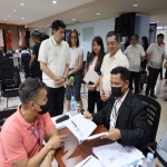 Department of Social Welfare and Development (DSWD) Officer-in-Charge (OIC) Eduardo M. Punay (left) and Commission on Elections (COMELEC) Chair George Erwin Garcia (right) inspect the ongoing voter registration activity, under the Register Anywhere Project (RAP), at the DSWD Central Office. Also joining the inspection are DSWD 72nd Anniversary Committee Chair, Undersecretary Sally Navarro (2nd from left); and Vice-Chair, Assistant Secretary Ivy Grace Rivera (2nd from right).