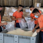 Ever-ready volunteers assist in the repacking of various relief goods at the Department of Social Welfare and Development's (DSWD) National Resource Operations Center (NROC) in Pasay City.