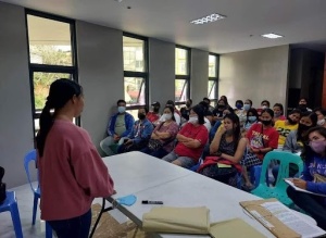 Celyn shares her inspiring story to fellow beneficiaries of Pantawid Pamilyang Pilpino Program (4Ps) during a gathering of parent-beneficiaries.